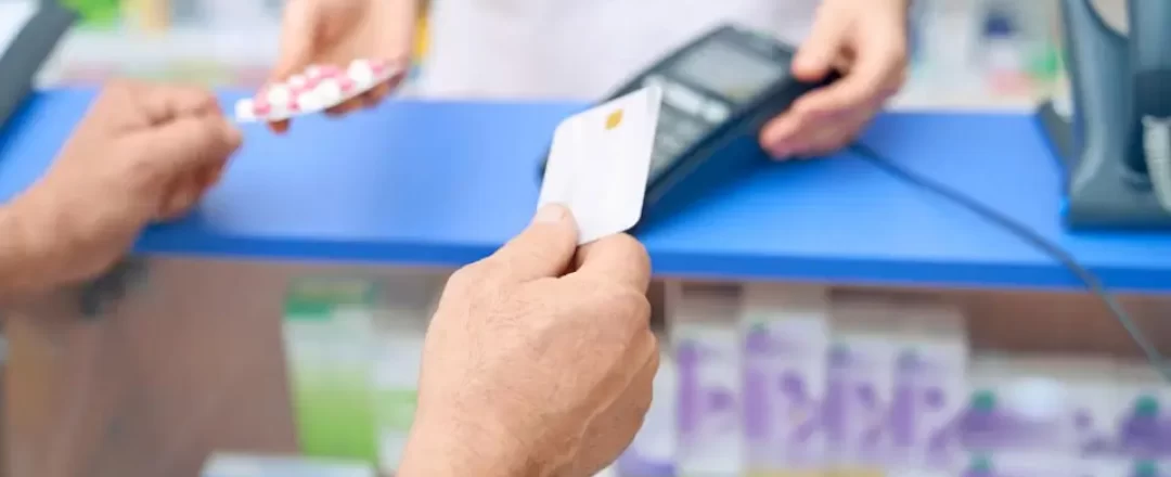 customer-paying-pills-using-credit-card